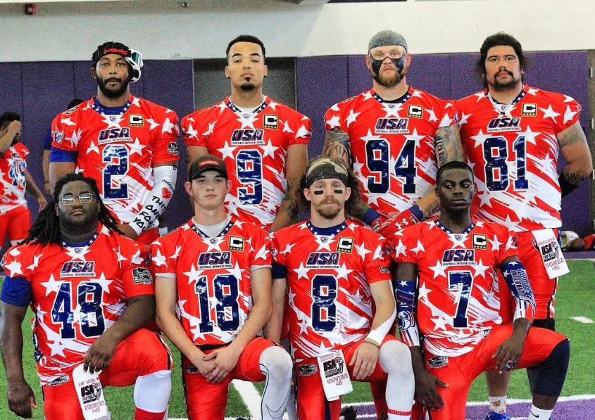 USA Football International players together in red team uniforms